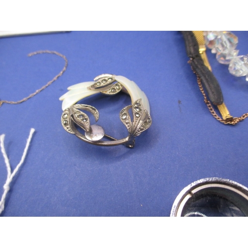 169 - A parcel of costume jewellery to include some silver and a gold watch, all in used condition