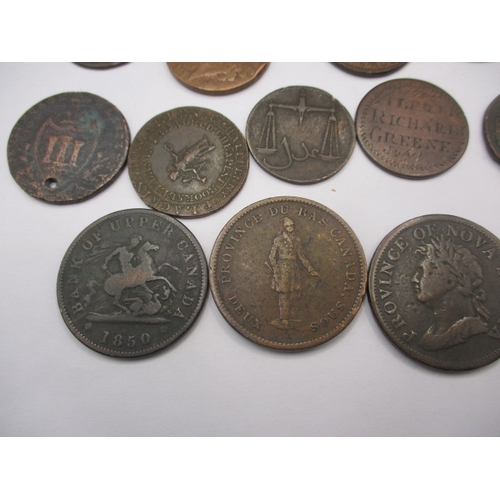 241 - A parcel of Trade and bank tokens, to include Canadian examples, all in circulated condition