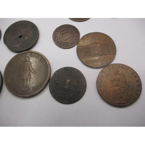 241 - A parcel of Trade and bank tokens, to include Canadian examples, all in circulated condition