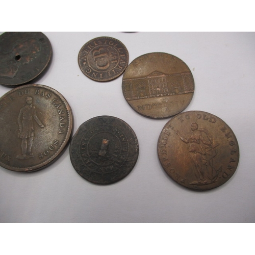 241 - A parcel of Trade and bank tokens, to include Canadian examples, all in circulated condition