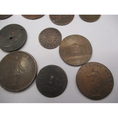 241 - A parcel of Trade and bank tokens, to include Canadian examples, all in circulated condition