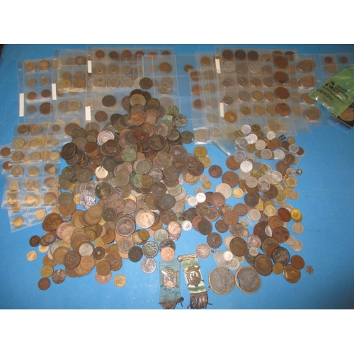 243 - A large quantity of world coins and curios, approx. 5kg in total, all circulated