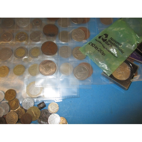 243 - A large quantity of world coins and curios, approx. 5kg in total, all circulated