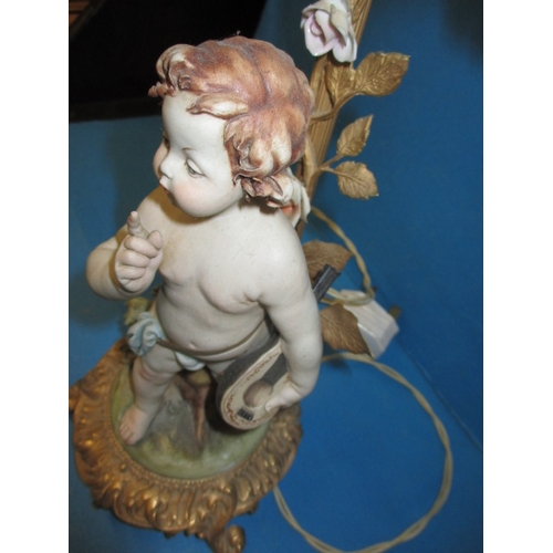 2 - Two vintage Italian porcelain cherub lamps, one with damage to fingers, the other loose to base, app... 