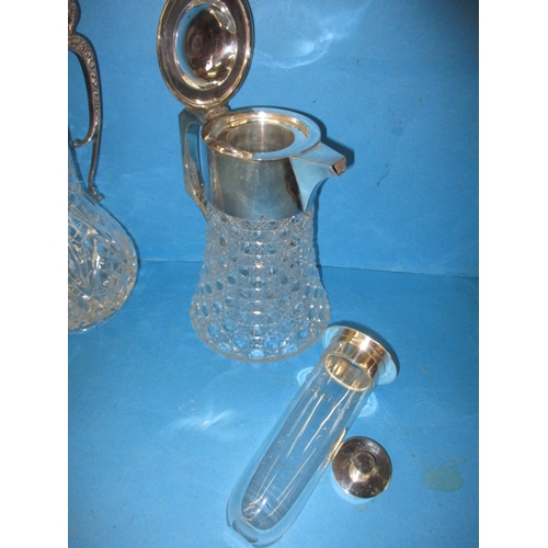 7 - A lead crystal claret jug and water jug, both with plated mounts and in good pre-owned condition, on... 