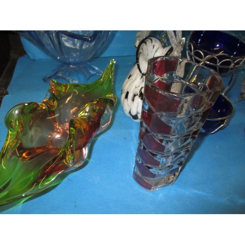 10 - A large quantity of vintage glass items, to include goblets, vases and bowls, all in used condition ... 