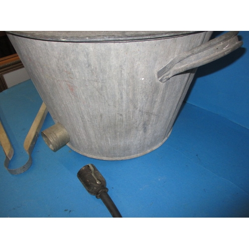 14 - A vintage galvanised washing pot, with heating element in base, in used condition