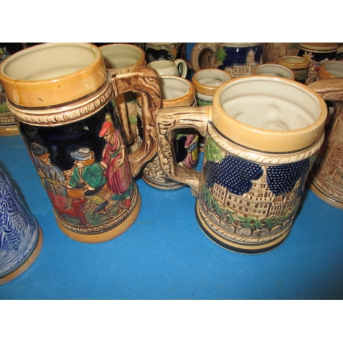 22 - A large collection of ceramic beer steins, various sizes and makers, all in used condition with no o... 