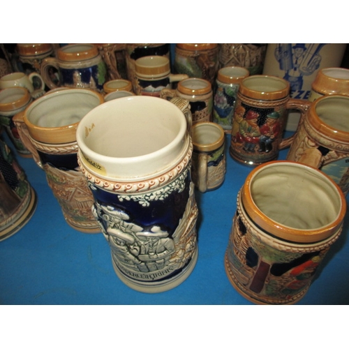 22 - A large collection of ceramic beer steins, various sizes and makers, all in used condition with no o... 