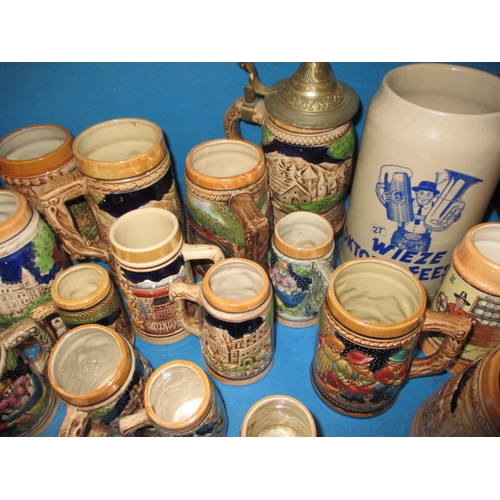 22 - A large collection of ceramic beer steins, various sizes and makers, all in used condition with no o... 