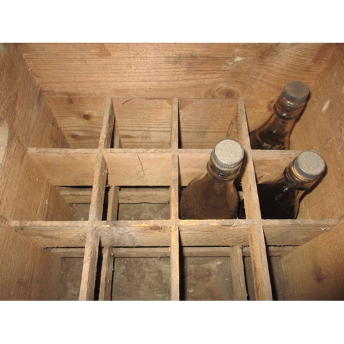 23 - A Royal Norfolk Table waters bottle crate from Kings Lynn and 3 vintage bottles, having are-related ... 