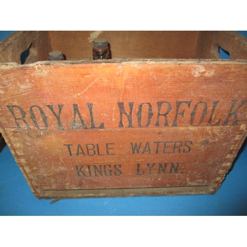 23 - A Royal Norfolk Table waters bottle crate from Kings Lynn and 3 vintage bottles, having are-related ... 