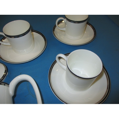 26 - A Wedgwood ‘Essence’ design coffee set, 6 cups and saucers and coffee pot, all in unused condition