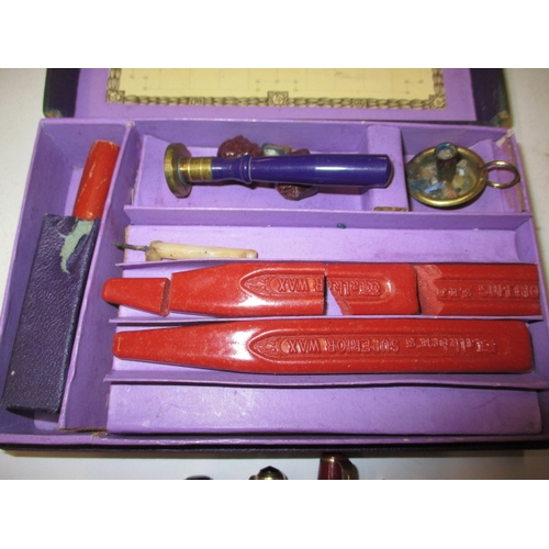 42 - A parcel of fountain pens and a wax sealing set, all in used condition