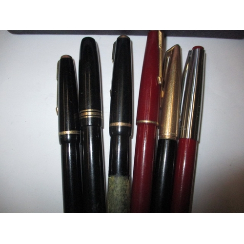 42 - A parcel of fountain pens and a wax sealing set, all in used condition