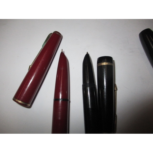 42 - A parcel of fountain pens and a wax sealing set, all in used condition