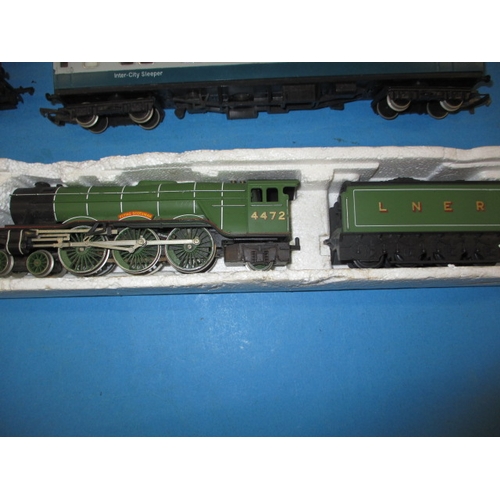 47 - A parcel of ‘00’ gauge model railway items to include a Flying Scotsman loco and tender, all in used... 