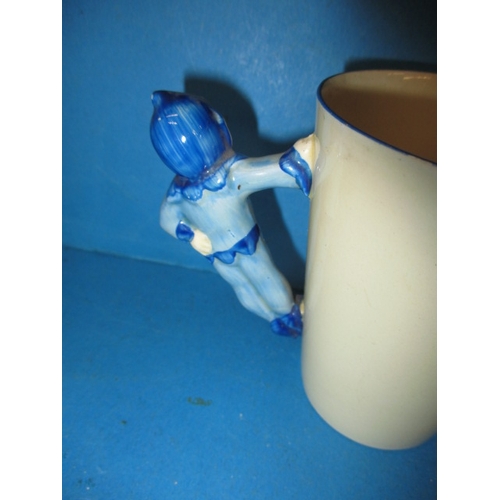 49 - A Clarice Cliff  gnome ware beaker with blue pixie handle and matching banding to rim, having a smal... 