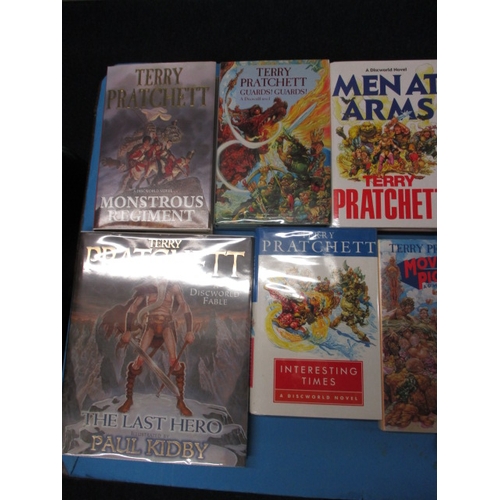 52 - A large quantity of first edition hard back Terry Pratchett Discworld books, all in good pre-owned c... 