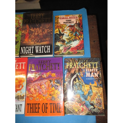 52 - A large quantity of first edition hard back Terry Pratchett Discworld books, all in good pre-owned c... 