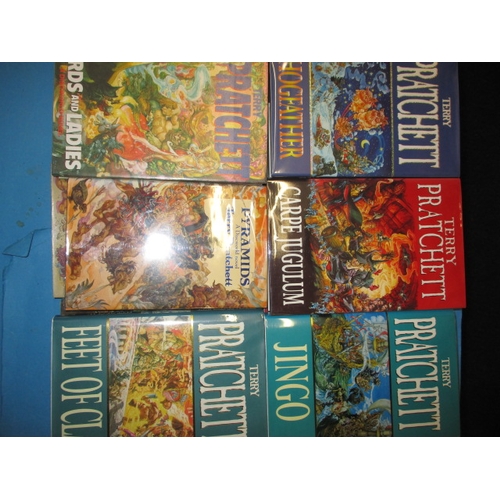 52 - A large quantity of first edition hard back Terry Pratchett Discworld books, all in good pre-owned c... 