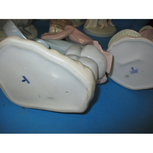 53 - A large quantity of Lladro and Nao figures, all with no observed damage