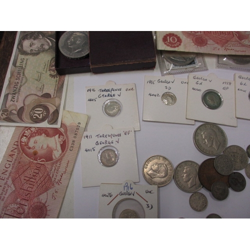 58 - A quantity of vintage coins and banknotes, to include some silver examples, all in circulated condit... 