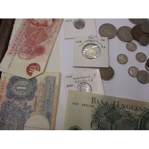 58 - A quantity of vintage coins and banknotes, to include some silver examples, all in circulated condit... 