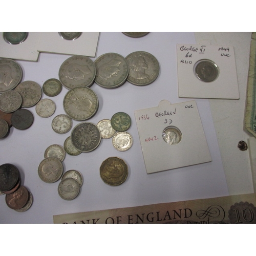 58 - A quantity of vintage coins and banknotes, to include some silver examples, all in circulated condit... 