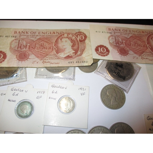 58 - A quantity of vintage coins and banknotes, to include some silver examples, all in circulated condit... 