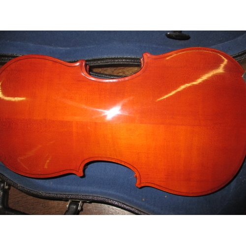 62 - A cased violin and bow, in good pre-owned condition