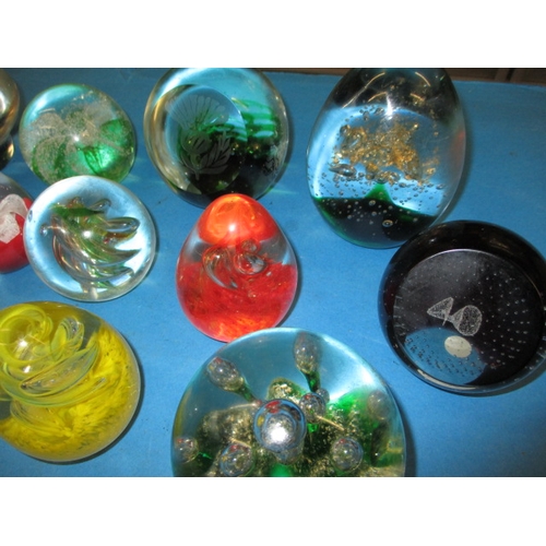 63 - A parcel of glass paperweights, all in used condition with no observed damage