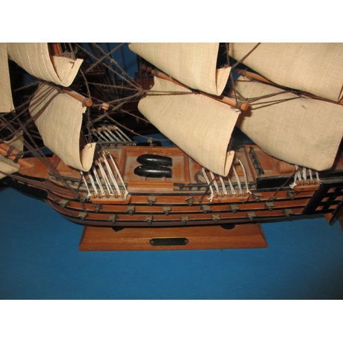 65 - Two model sailing ships, the Bounty & Victory, both in used condition, approx. length of largest 62c... 