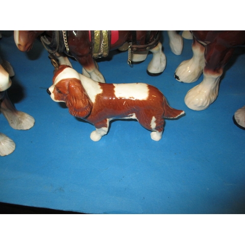 67 - A collection of ceramic horses and a Beswick dog, all in pre-owned condition with no observed damage... 