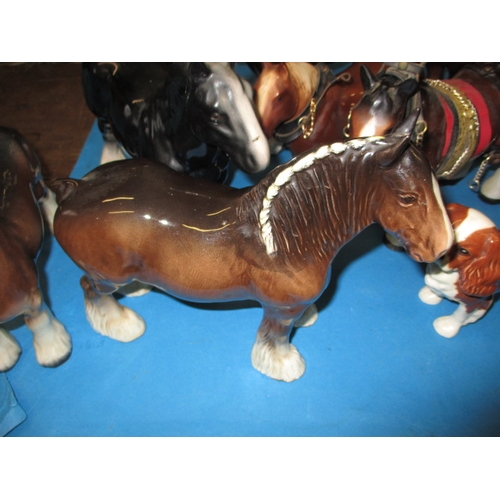 67 - A collection of ceramic horses and a Beswick dog, all in pre-owned condition with no observed damage... 