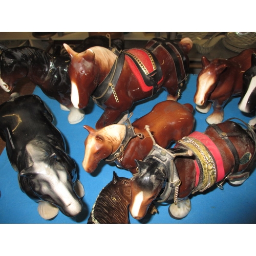 67 - A collection of ceramic horses and a Beswick dog, all in pre-owned condition with no observed damage... 