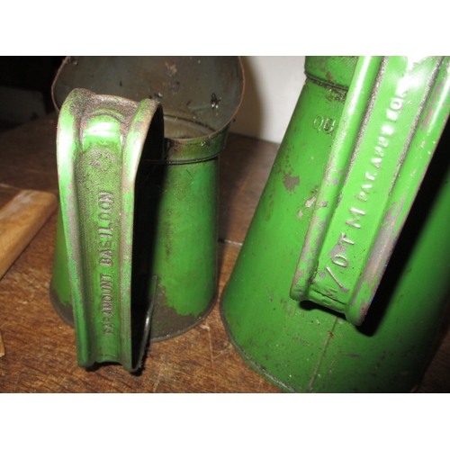 71 - A parcel of vintage automotive lubrication cans and a Morris chain hoist, all in used condition