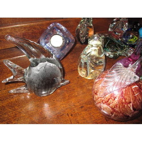 73 - A quantity of glass paperweights and ornaments, all in pre-owned condition so may have use related m... 