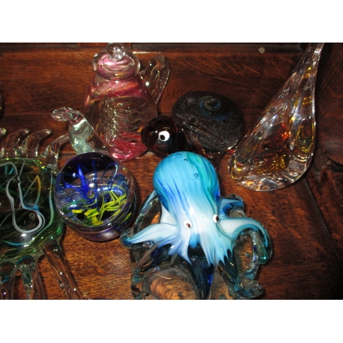 73 - A quantity of glass paperweights and ornaments, all in pre-owned condition so may have use related m... 