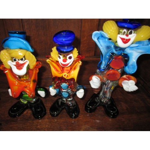 76 - 8 Murano and other glass clowns, all pre-owned so may have use related marks