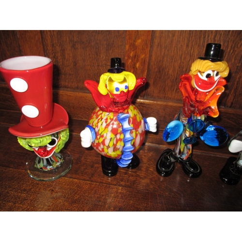 77 - A quantity of Murano and other glass clowns, all pre-owned so may have use related marks