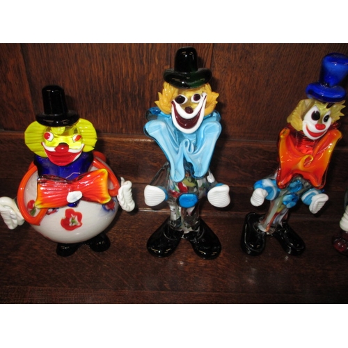 77 - A quantity of Murano and other glass clowns, all pre-owned so may have use related marks