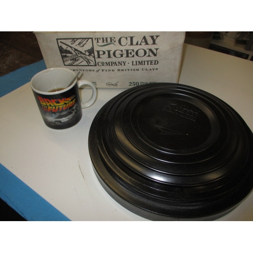 83 - A large trade show display clay pigeon, approx. diameter 30cm, made by the Clay Pigeon Company, Nott... 