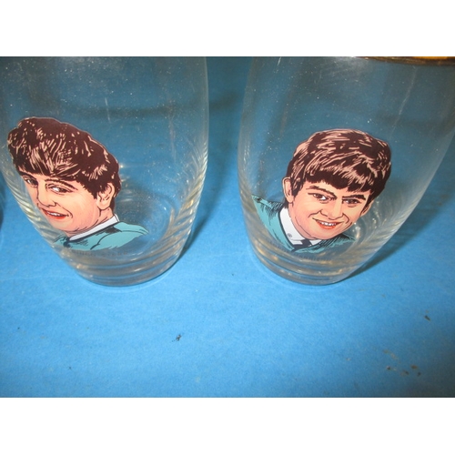 88 - A set of 4 Beatles lemonade glass, 1960’s period items in good pre-owned condition