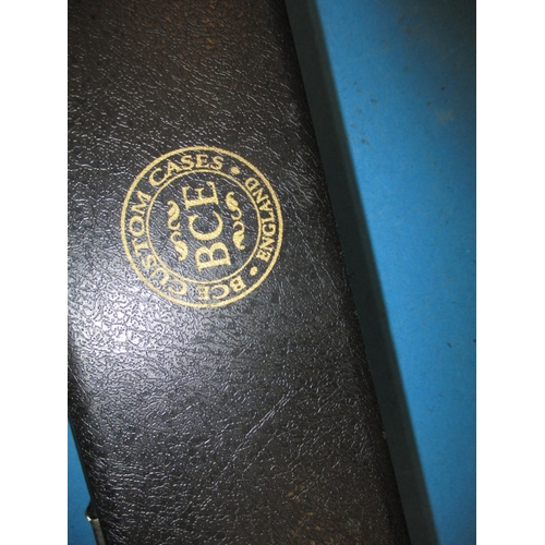 91 - A Power Master two piece snooker cue in a BCE hard case, in good pre-owned condition