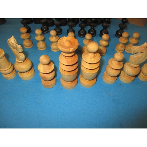 97 - Two vintage box wood chess sets, the Staunton set missing a white bishop, pre-owned with use-related... 