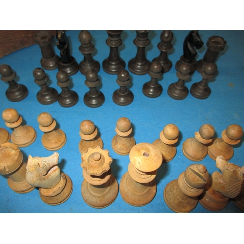 97 - Two vintage box wood chess sets, the Staunton set missing a white bishop, pre-owned with use-related... 