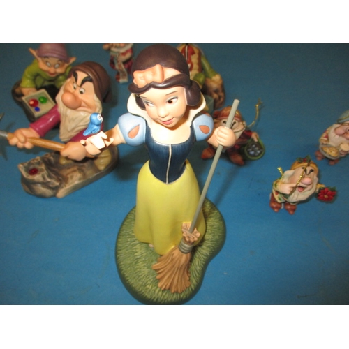 106 - A parcel of Disney Snow White collectable figures, all in pre-owned condition