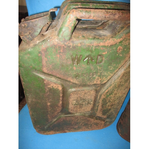 112 - An early 20th century Shell petrol can and two military ‘Jerry’ cans, all in used condition