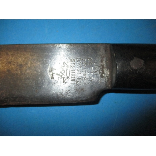 113 - A WWII 1940 dated machete with USA makers mark, approx. length 50cm in pre-owned condition with use ... 